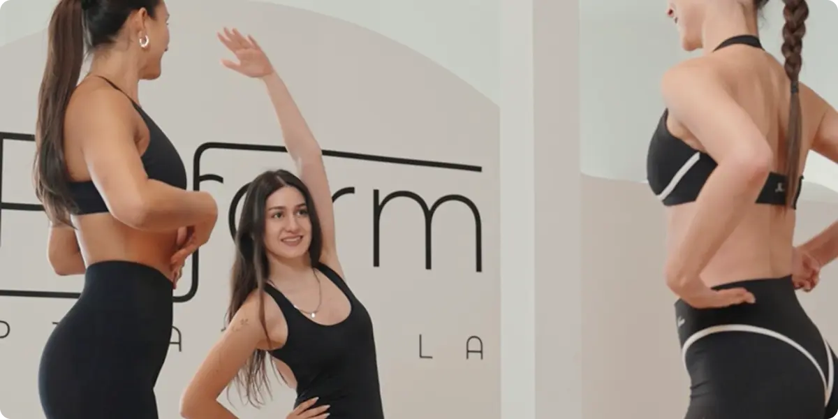 Reform Pilates instructors in a group reformer class